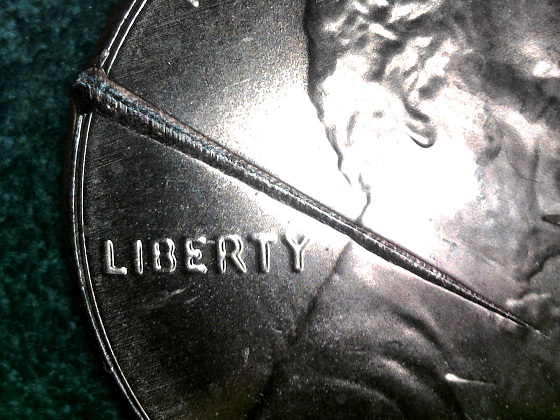 1994-D-LMC--Damaged-Coin-Guess-What-Did-It..